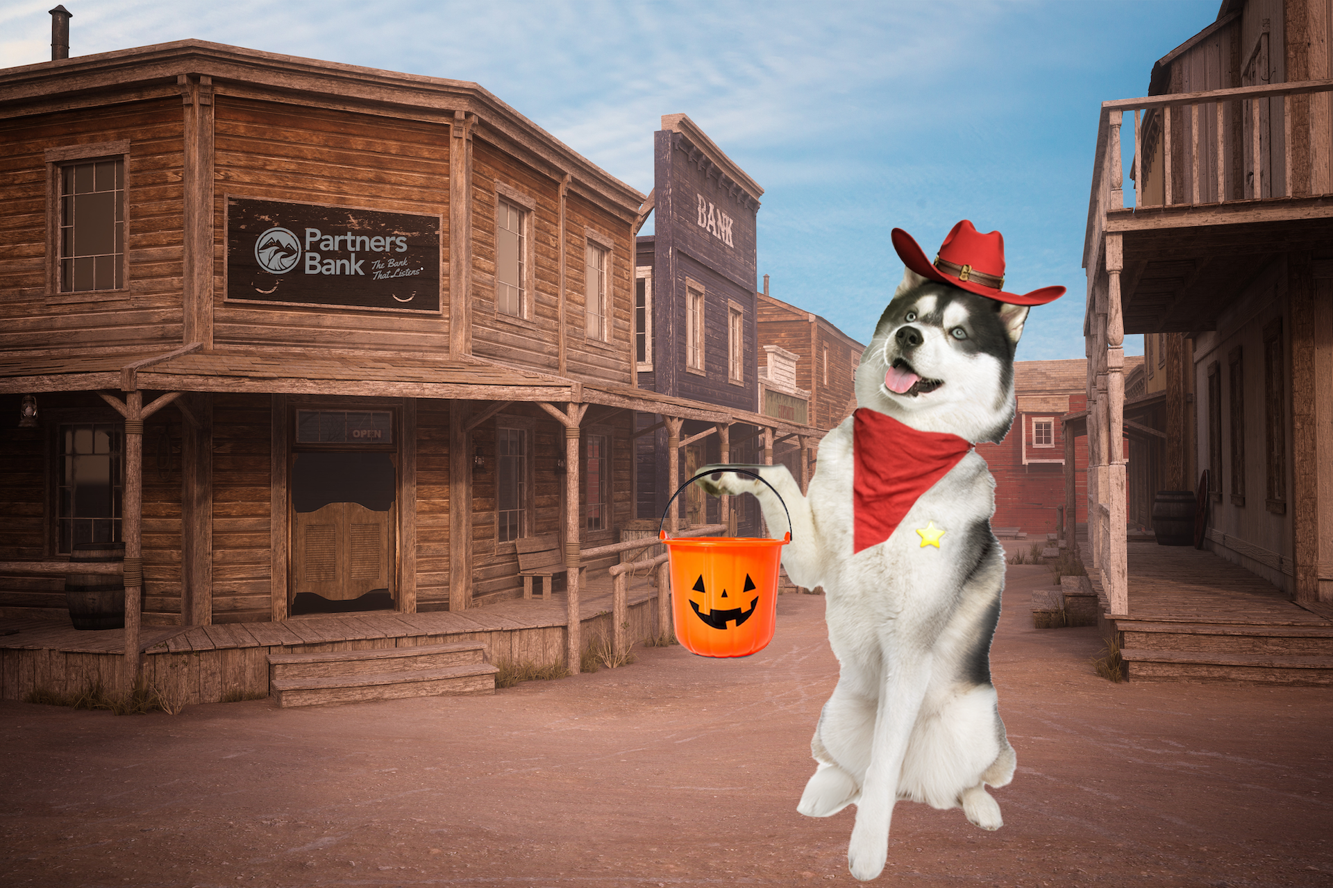 Cache the Dog dressed up in a western style town for halloween