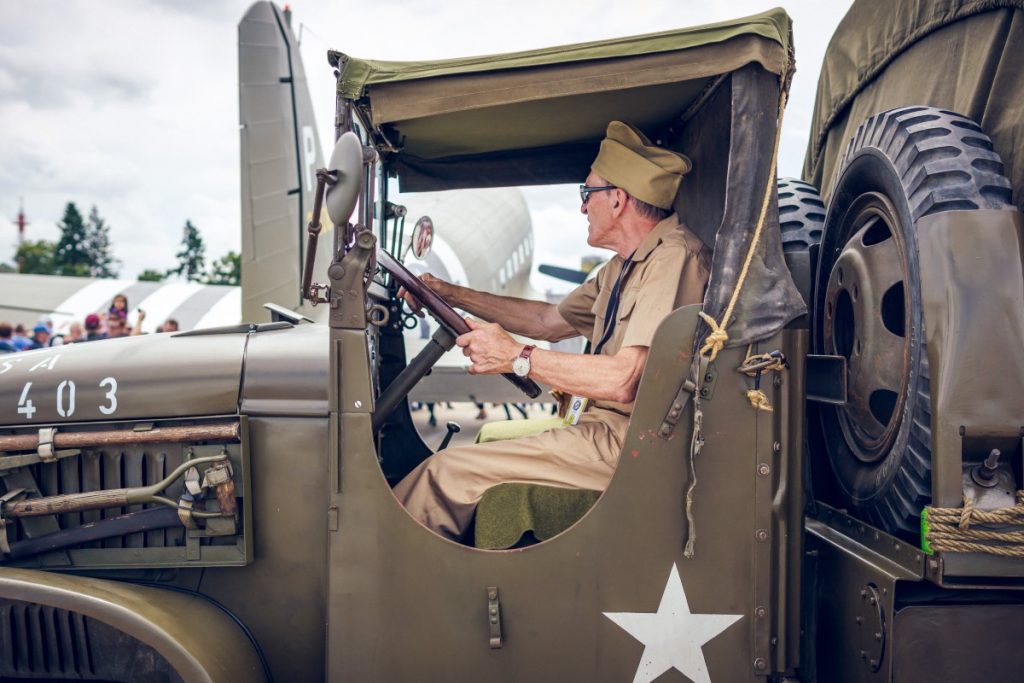 military person driving military truck