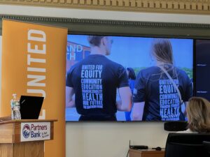 United Way presentation on projector at Partners Bank