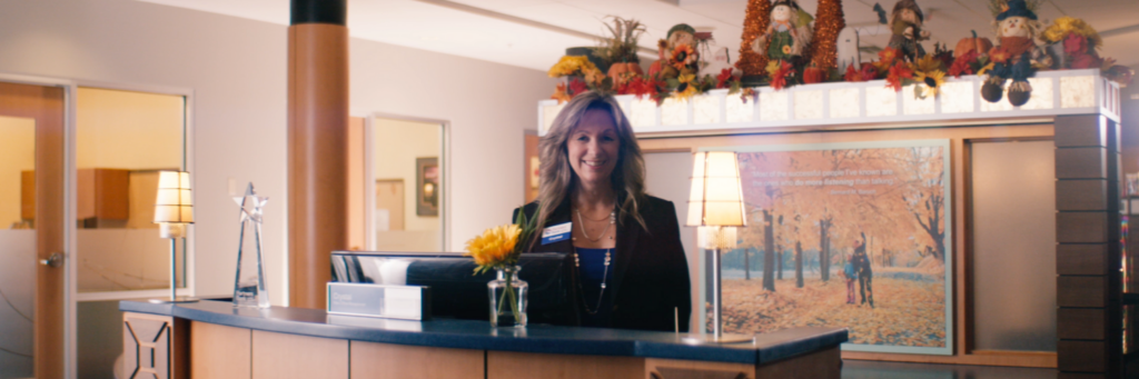 Partners Bank employee at desk