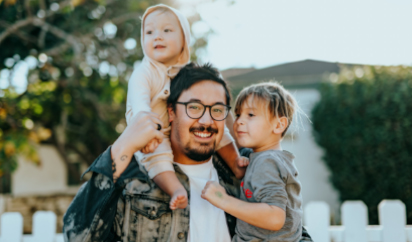 Man with glasses and children