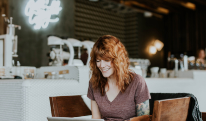 Red hair woman on laptop